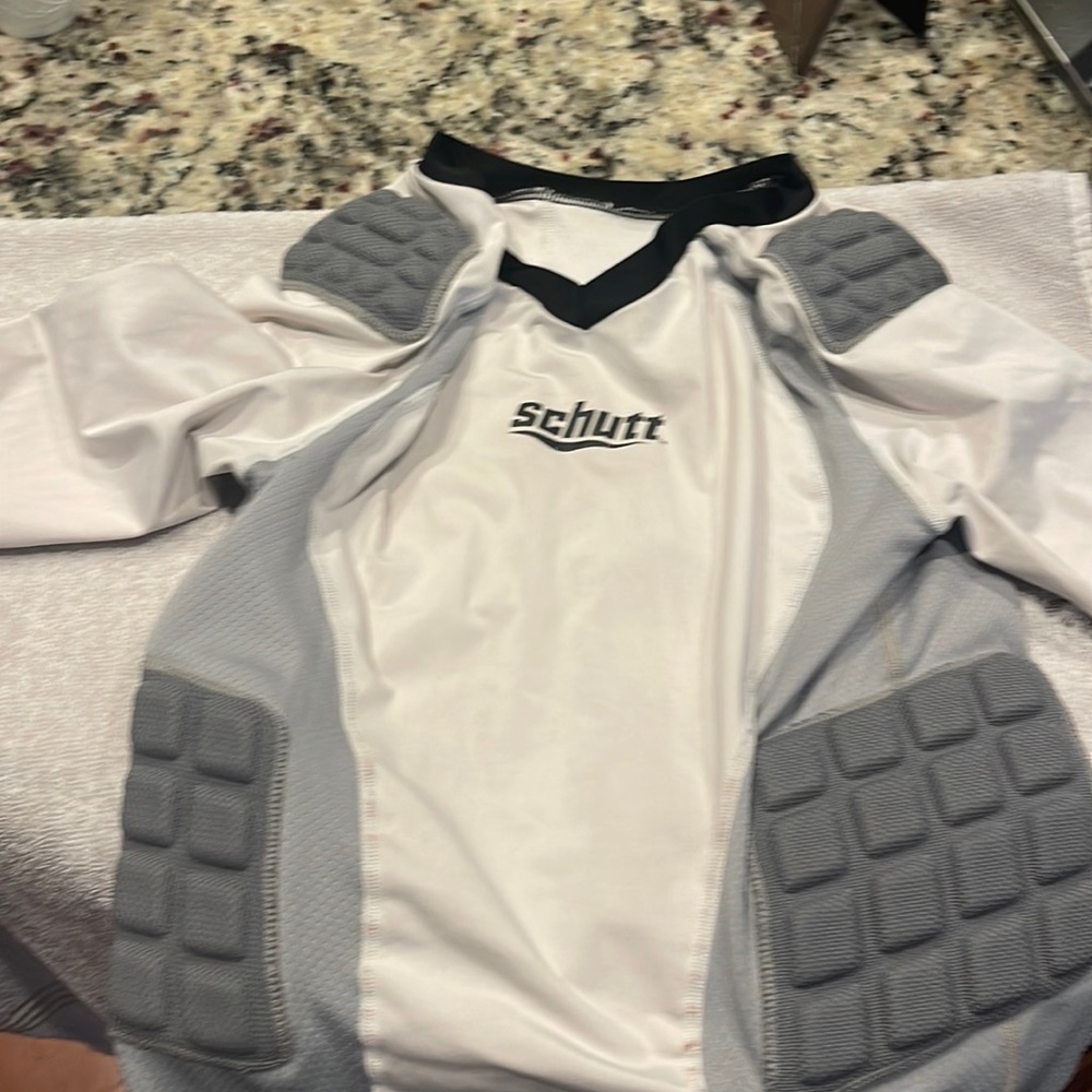 Football under shirt